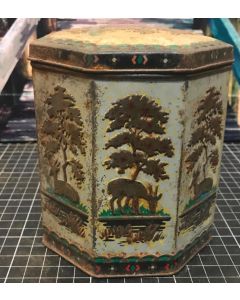 Vintage embossed Christmas tin with deer & Christmas trees