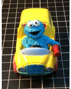 Vintage TYCO Sesame Street Cookie Monster Driving School Bus Toy Car