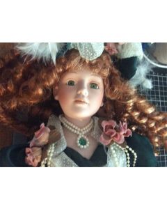 Vintage Victorian Beautiful Porcelain Curly Haired Doll in Elegant Green Dress